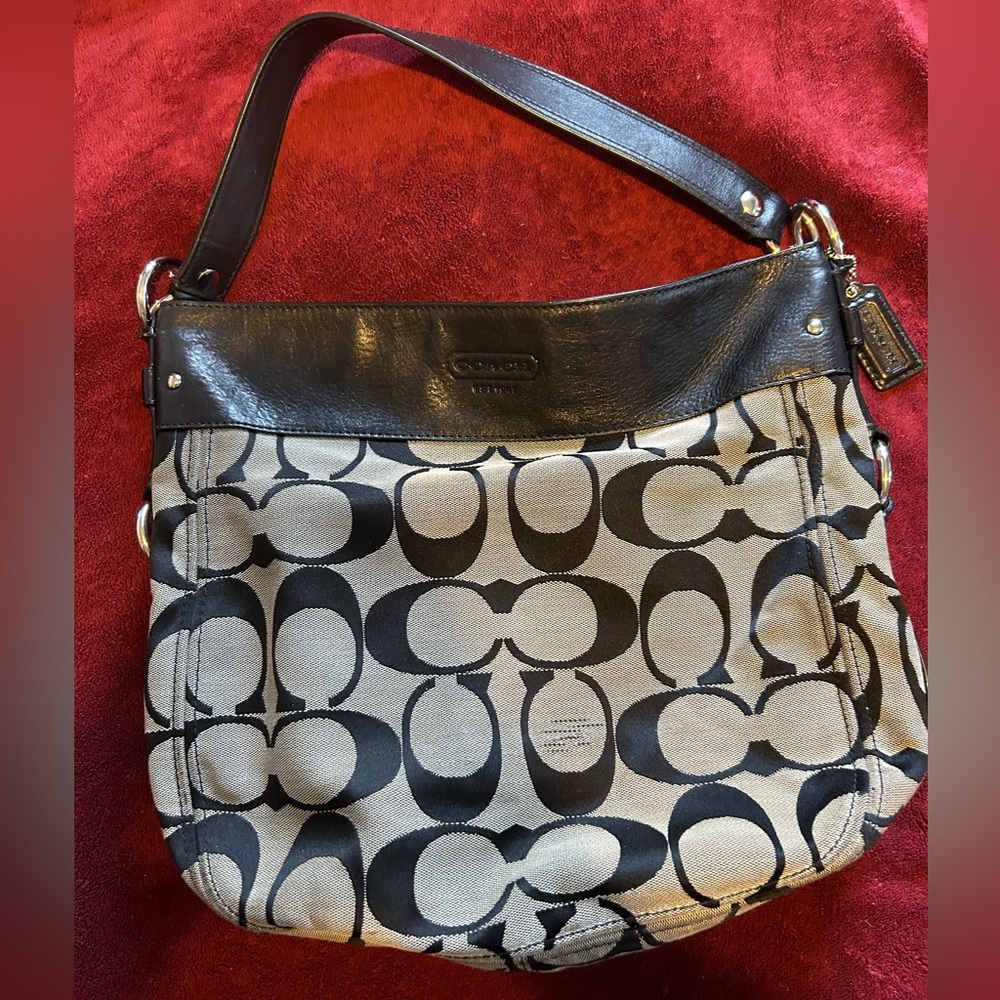 Authentic Coach ZOE handbag. Slightly used. Amazingly clean inside and outside.
